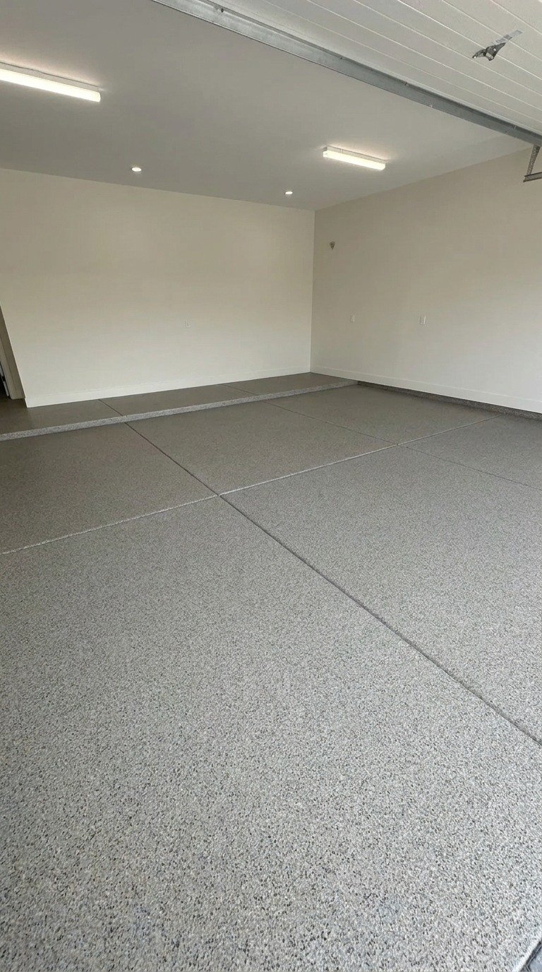 Epoxy flake broadcast garage floor coating in a Naples, Florida home