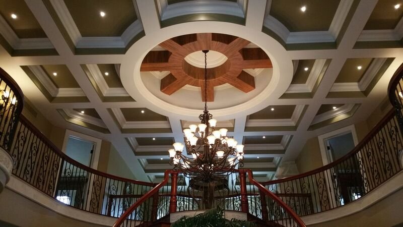 Coffered ceiling with stained wood millwork centre