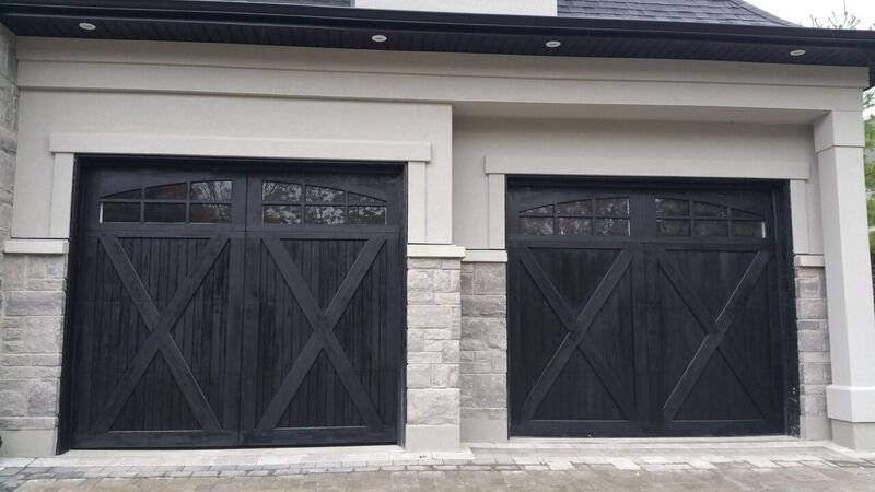Black stained wood carriage garage doors