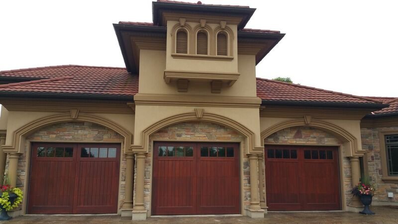 Stained and sealed wood garage doors, Southwest Florida home