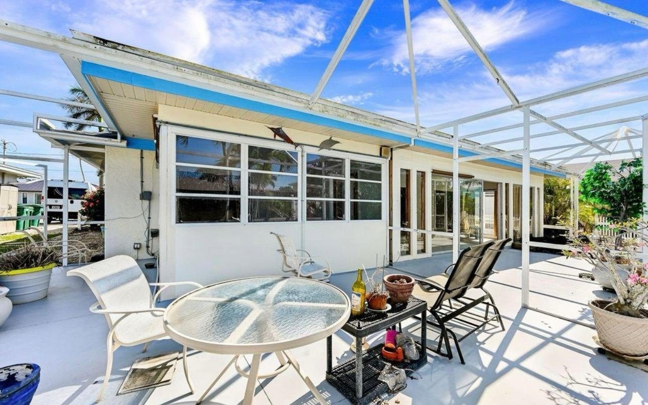 135 Tahiti Cir — backyard before renovation