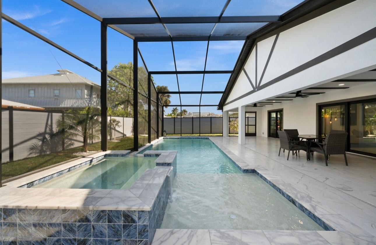 Pool and covered lanai after a full renovation in Naples, Florida